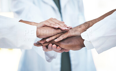 Buy stock photo Hands stacked, doctors and closeup in healthcare teamwork, solidarity and support with hospital collaboration. cooperation of medical people, staff or employees together hand sign of clinic workforce