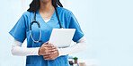 Hands, tablet and doctor at hospital with space for promotion, mockup and wellness branding. Woman, medic and mobile touchscreen for telehealth mock up, service or consulting in clinic for healthcare