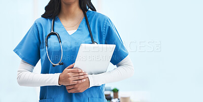 Buy stock photo Hands, tablet and doctor at hospital with space for promotion, mockup and wellness branding. Woman, medic and mobile touchscreen for telehealth mock up, service or consulting in clinic for healthcare