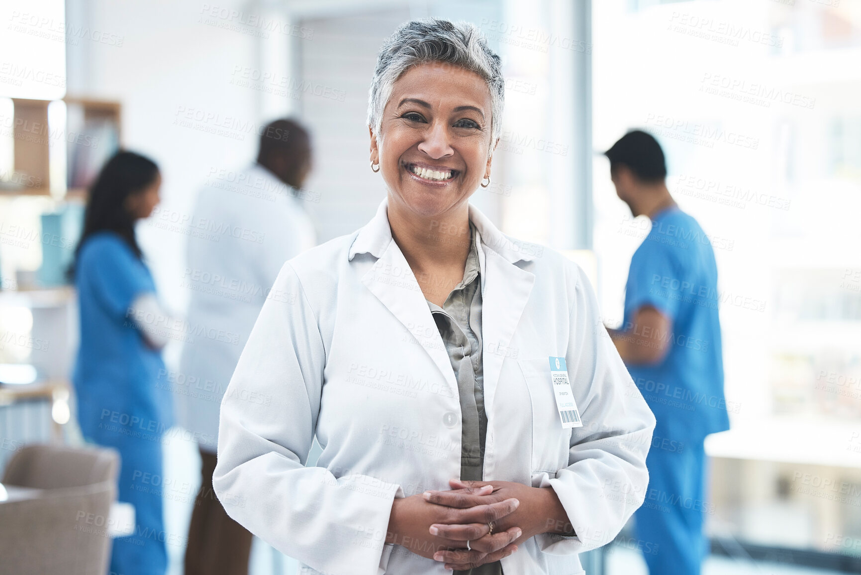 Buy stock photo Senior doctor, woman and smile in clinic portrait for inspection, excited and vision for expert. Female medic, leadership and management with confidence, success and happy for career goal at hospital