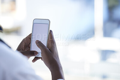 Buy stock photo Doctor, man and hands with phone mockup for telehealth, healthcare or life insurance at hospital. Hand of male medical professional holding smartphone and copy space display for advertising at clinic
