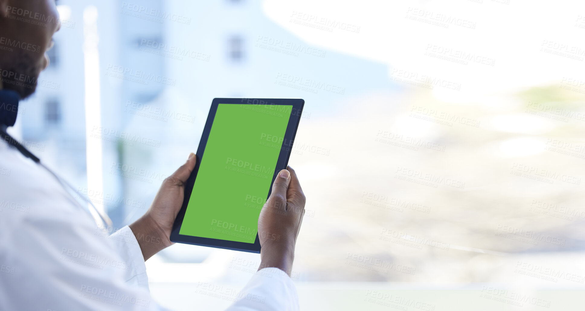 Buy stock photo Doctor, man and hands with green screen on tablet for Telehealth, healthcare or life insurance at the hospital. Hand of male medical professional holding technology with mockup or copy space display