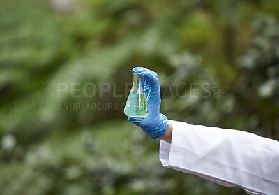 Buy stock photo Science, nature and scientist hand with beaker for liquid sample inspection, environment and ecosystem. Agriculture, biology and person with glass in forest for analysis, research and study mock up