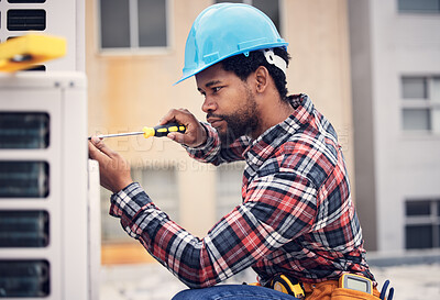 Buy stock photo Black man, technician and maintenance with engineering and ac repair with handyman working with tools on roof. Fix air conditioner, male electrician with screwdriver and power generator with service