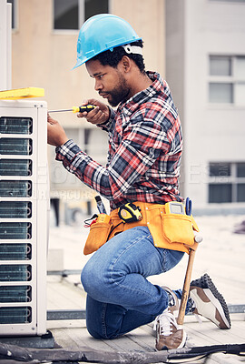 Buy stock photo Black man, electrician and maintenance with engineer and ac repair with handyman working with tools on roof. Fix air conditioner, male technician with screwdriver and power generator with service