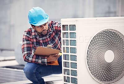 Buy stock photo Black man, electrician with clipboard for air conditioner inspection, handyman working on rooftop with focus. Maintenance check, AC repair and male technician with power generator and service