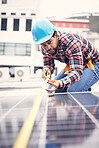 Engineer man, measuring tape and solar panel on roof for sustainable planning, clean energy or development. Technician, photovoltaic system and rooftop installation for power, sustainability and job