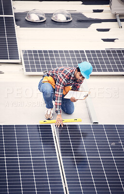 Buy stock photo Black man with clipboard, solar panels inspection and renewable energy, sustainable and eco friendly technology. Maintenance check, male engineer and infrastructure with electricity and top view