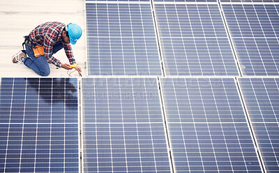 Buy stock photo Black man, solar panel installation and renewable energy, sustainability and eco friendly technology. Maintenance, male engineer and infrastructure, electricity and top view with energy saving