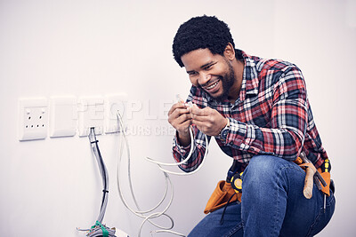Buy stock photo Electric, industry and electrician working on a switchboard with cables for current, fuse or voltage. Electricity, power and African male industrial worker doing maintenance, repairs or fixing plugs.