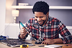 Black man, technician fixing circuit board and computer hardware, soldering iron tools and tech repair. Maintenance, magnifying glass and electrical fix with happy male working on device motherboard