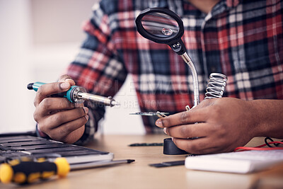 Buy stock photo Man, technician hands and soldering iron fixing electronics, magnifying glass and computer hardware repair. Technology maintenance, tools and engineering with electrical fix and male working