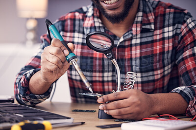 Buy stock photo Man, electrician hands with soldering iron to fix computer hardware, magnifying glass and tech repair. Maintenance, tools and technician fixing electrical problem with male working on device 