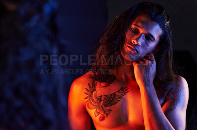 Buy stock photo Man, face and mirror reflection for beauty, art or self care of a person with hand on skin. Strong male model with a tattoo, glow and creative motivation or light for aesthetic backdrop