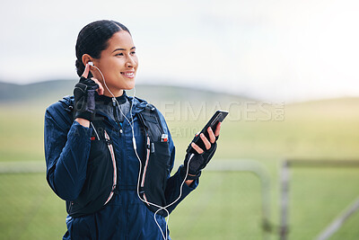 Buy stock photo Music, phone and woman smile in the countryside ready for fitness and exercise with mockup. Sports, training and mobile headphones of a female athlete with internet audio and web radio for workout