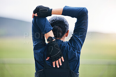 Buy stock photo Fitness, workout and woman stretching her arms for outdoor training for a race, marathon or competition. Sports, health and back of a female athlete runner doing a warm up exercise before running.