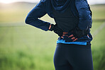 Back pain, fitness and sports woman outdoor with scoliosis, health risk and burnout from marathon. Closeup female athlete, spine injury and joint problem of tired muscle, first aid and emergency care