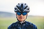 Portrait, cycling or girl athlete in nature for exercise, workout or training for triathlon sports or fitness. Woman cyclist, helmet gear or face of biker on break exercising for cardio endurance 