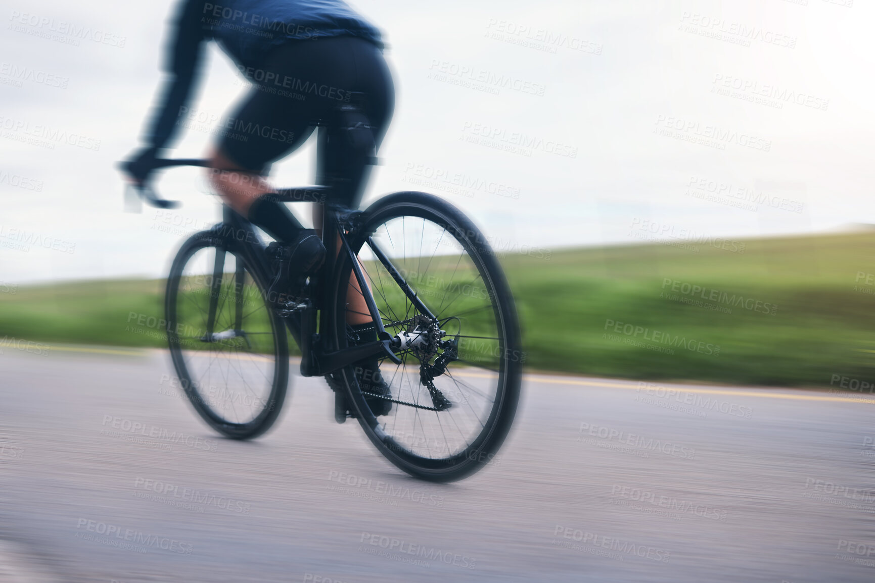 Buy stock photo Person, bicycle athlete and cycling on motion blur in nature, countryside and training for triathlon from behind. Cyclist, mountain bike and speed on road for sports, power or cardio competition race