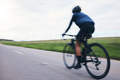 Buy stock photo Person, bicycle and cycling on motion blur, sky mockup and countryside road for triathlon from behind. Cyclist, bike and speed for sports training, cardio performance and power for competition race