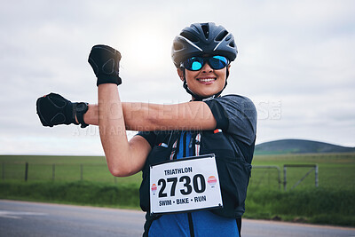 Buy stock photo Stretching, triathlon and cycling with woman in road for training, competition and workout. Warm up, fitness and exercise with female cyclist in nature ready for performance, summer and marathon