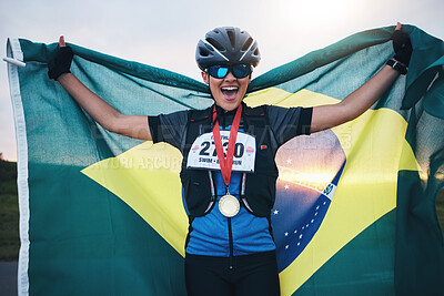 Buy stock photo Winner sports, happy woman from brazil with flag and gold medal winning athlete, outdoor cycling race or triathlon. Happiness, win and cyclist with smile, fitness and world record with national pride