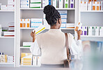 Woman, drugs and shelf for healthcare illness, pain or relief at pharmacy looking at pills or medication. Sick female customer or patient taking pharmaceutical products for self diagnosis at a clinic