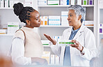 Doctor, consulting and patient for healthcare prescription, medication or diagnosis for cure, illness or pain at pharmacy. Woman medical pharmacist talking to customer about pills or drugs at clinic