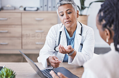 Buy stock photo Doctor, laptop and woman consulting results, healthcare prescription or medicare diagnosis at desk. Senior female medical expert in consultation, research or health advice on computer at clinic