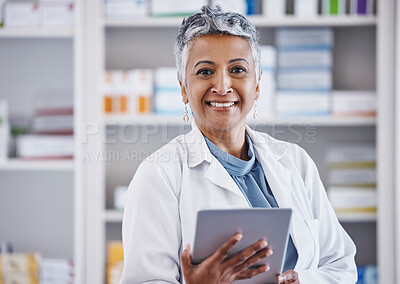 Buy stock photo Senior woman, pharmacist and tablet in portrait for healthcare, medicine or entrepreneurship at store. Female pharma expert, mobile touchscreen or excited for small business, service or wellness shop
