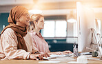 Computer, business office and muslim woman coworking, planning and online management at startup company. Happy  diversity people or hijab employee with digital research, website update and desktop pc