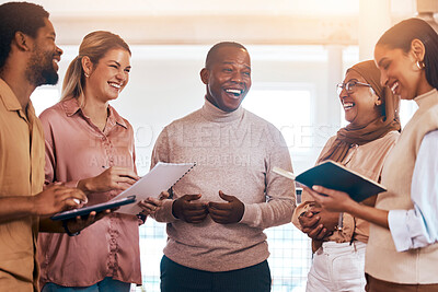 Buy stock photo Laughing business people, meeting and documents in collaboration for planning, teamwork or training in office. Group of diverse employees in team brainstorming, discussion or sharing startup ideas