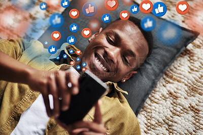 Buy stock photo Social media, love icon or black man with a phone for texting communication or online dating chat. Like, graphic overlay or relaxed person on mobile app website or digital network with heart emojis