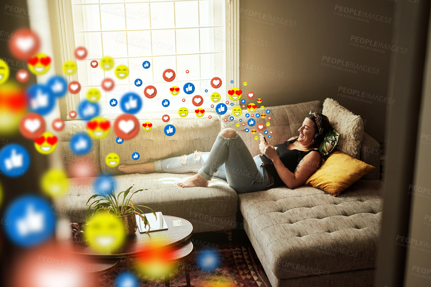 Buy stock photo Sofa, social media icon or woman with a phone for communication, social media text for online dating. Like overlay, relax or happy girl on mobile app, chat website or digital network with heart emoji
