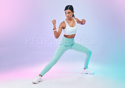 Buy stock photo Fitness, woman and fighting pose in studio for karate, martial arts or defence training on gradient background. Power, sports and indian female in intense workout, exercise and posing while isolated