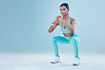 Fitness, focus and mockup with a sports woman in studio on a gray background for health or wellness. Exercise, mindset and space with a young female athlete training for a healthy body or lifestyle