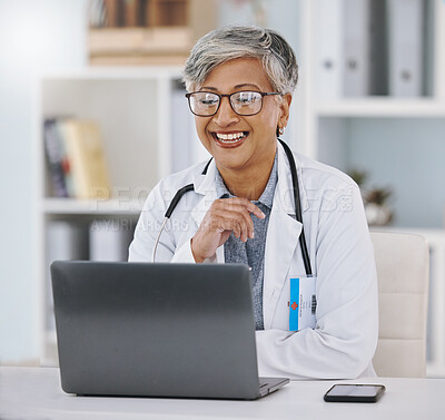 Buy stock photo Senior doctor, woman with smile and laptop for video call with virtual medical consultation or research for case. Health insurance, online healthcare conference with happy person and communication