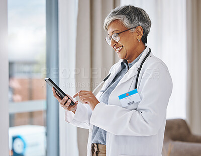 Buy stock photo Woman doctor, phone and happy in hospital for communication, online consultation or research. Medical professional female with smartphone internet for advice, healthcare and innovation on mobile app