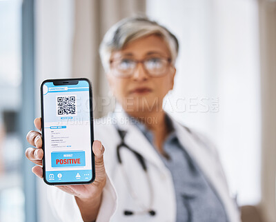 Buy stock photo Woman doctor, phone and covid test results with QR code in hand ready for medical support. Clinic, hospital and positive result on digital healthcare and wellness app for safety and health care help