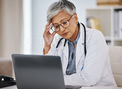 Buy stock photo Woman doctor, laptop and stress or headache in hospital office while working online for research. Medical professional female with anxiety, burnout and depression for healthcare results