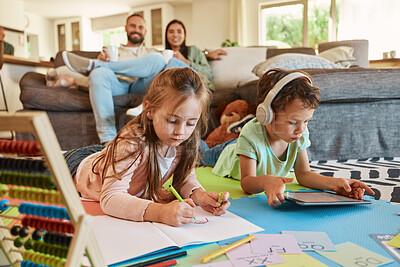 Buy stock photo Learning, floor and children with family relax on sofa for home writing, creative development and tablet. Kids on carpet on digital games, headphones and online education with happy parents on couch
