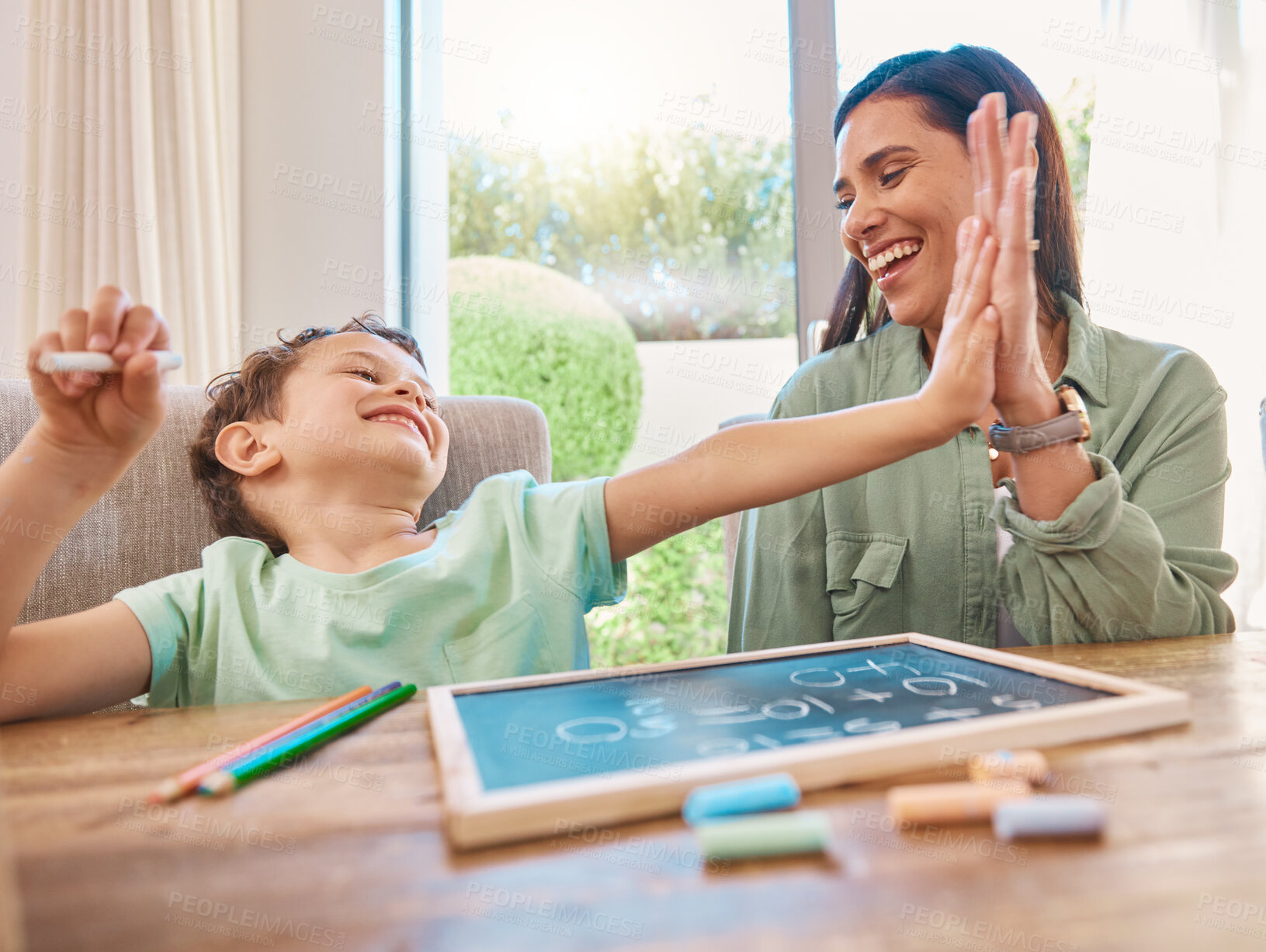 Buy stock photo High five, mother and child education, learning and teaching math, numbers and home development goals or support. Yes, success and celebration hands of family, mom and happy kid with chalkboard