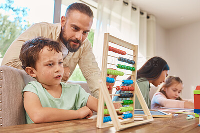 Buy stock photo Education, home school and father with his child with abacus helping him work on math homework. Study, knowledge and young dad teaching his son to count mathematics in the dining room of family home.