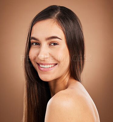 Buy stock photo Hair, happy and portrait of woman in studio for wellness, keratin treatment and healthy style on brown background. Salon aesthetic, smile and face of girl with cosmetics, texture and natural beauty