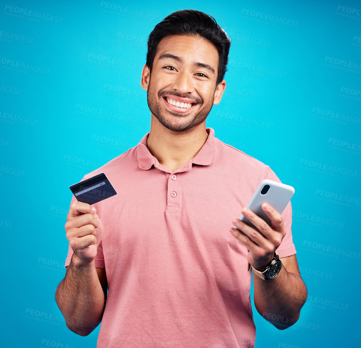 Buy stock photo Man with smartphone, credit card and smile in portrait, ecommerce and fintech isolated on blue background. Online shopping, internet banking and finance, technology and male with bank app in studio