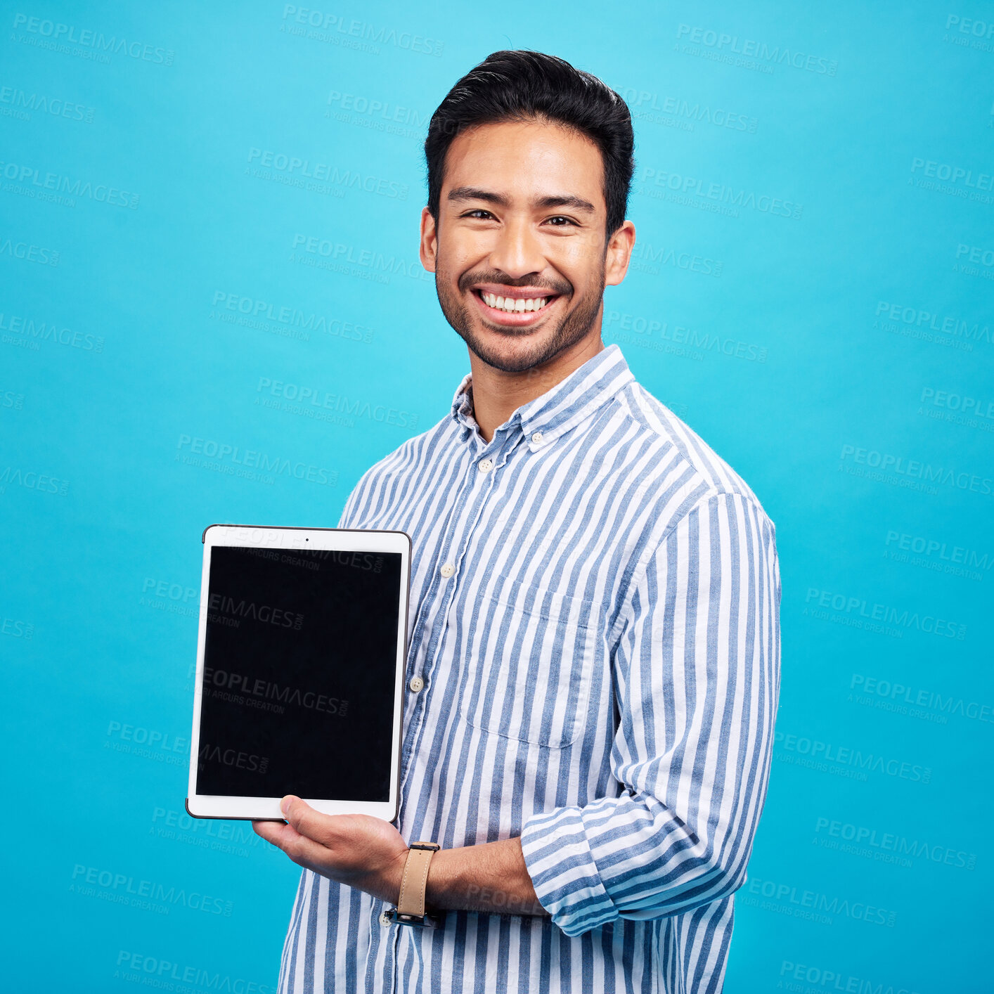 Buy stock photo Man, tablet and mockup screen, smile in portrait and digital device marketing with tech on blue background. Wireless touchscreen, website or internet branding, advertising and happy male in studio