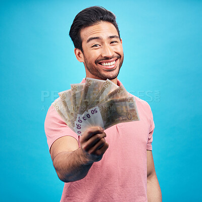 Buy stock photo Man in portrait, money fan with financial freedom and cash, prize or reward isolated on blue background. Finance with savings, bonus and payment, happy male person with economic success in studio