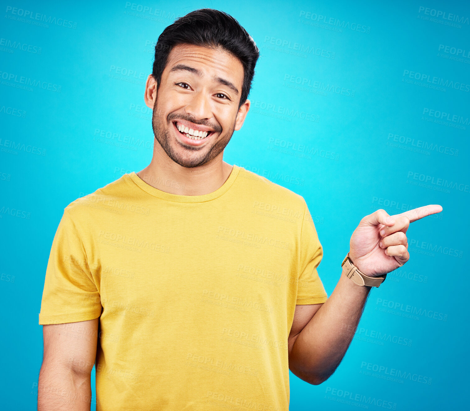 Buy stock photo Man is pointing, advertising and promo with happiness and branding isolated on blue background. Opportunity, deal or announcement, marketing news and promotion ad with happy male person in portrait