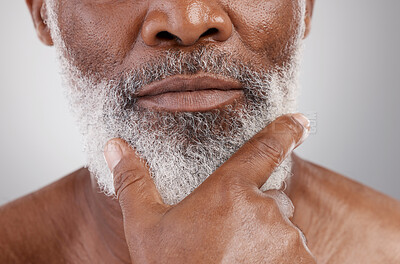 Buy stock photo Senior man, closeup and beard in studio for skincare, grooming and beauty routine on grey background. Facial, hair and elderly male relax with cosmetics, treatment and dermatology or moustache growth