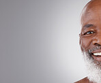 Senior black man, face and smile on mockup for skincare, hygiene or grooming against a gray studio background. Portrait of happy African elderly male smiling for self love or skin care on copy space